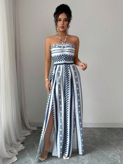 👗 50% RABATT NU! 💥 Geometrisk jumpsuit med halterneck och sidosprund – Unikt tryck och resår baktill – Mångsidig, perfekt för sommarfester eller resortkläder ✨
