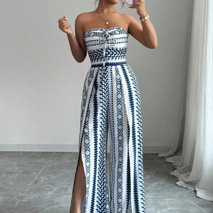 👗 50% RABATT NU! 💥 Geometrisk jumpsuit med halterneck och sidosprund – Unikt tryck och resår baktill – Mångsidig, perfekt för sommarfester eller resortkläder ✨