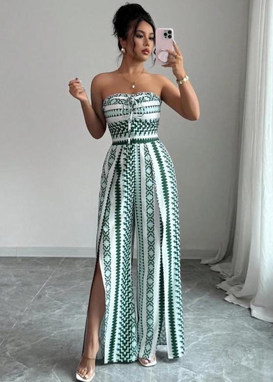 👗 50% RABATT NU! 💥 Geometrisk jumpsuit med halterneck och sidosprund – Unikt tryck och resår baktill – Mångsidig, perfekt för sommarfester eller resortkläder ✨