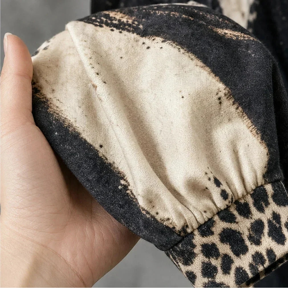 Leopard Swing – Leopardmönstrad stickad klänning med fransad fåll✨3% rabattkod: NOR3