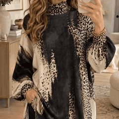 Leopard Swing – Leopardmönstrad stickad klänning med fransad fåll✨3% rabattkod: NOR3