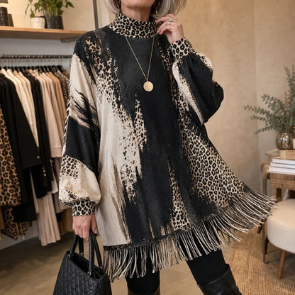 Leopard Swing – Leopardmönstrad stickad klänning med fransad fåll✨3% rabattkod: NOR3