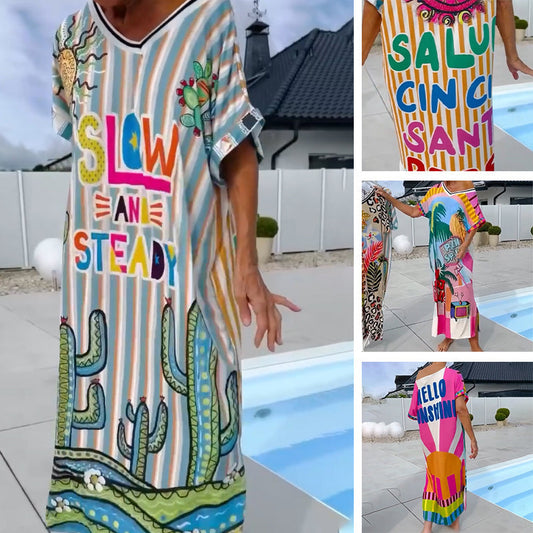 Maxiklänning med randigt tryck, korta ärmar och V-ringning