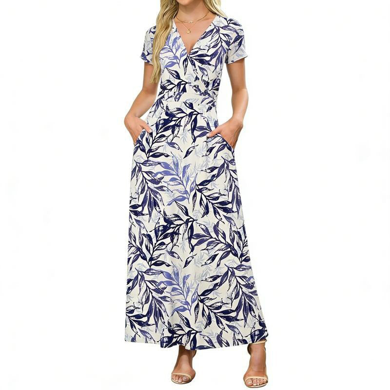 👗2026 Sommarrea 49% RABATT🌈 Dam V-ringad ankellång blommig strandklänning med fickor🎀